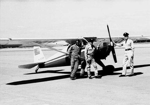 American servicemen posing with Gluckman's Luscombe at Goose Bay, Labrador. Photo Credit Fritz Adam, who is standing on the right. 