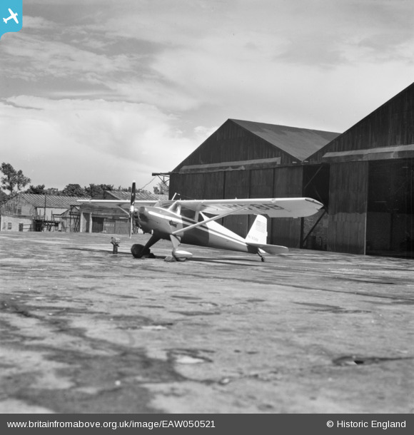 Luscombe 8 (N1838B) at Elstree Aerodrome, Aldenham near London in June 1953. This photograph was likely taken after he arrived from this trans-Atlantic flight and before his flight to Berlin-Tempelhof. Photographer unknown. britainfromabove.org.uk/en/image/EAW050521